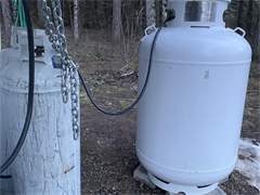 2 25 gallon propane tanks