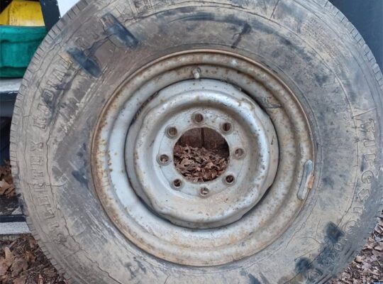 Free Ford/Dodge wheel/rim w/tire. Somebody needs!