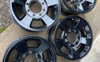 Ram wheels… 8-lug powder-coated alloy OE