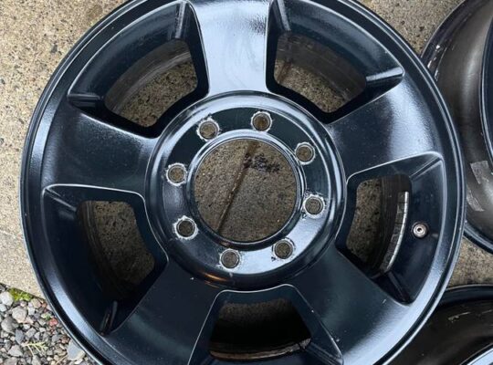 Ram wheels… 8-lug powder-coated alloy OE