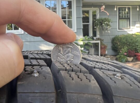 Like new studded tires and wheels 185/70R14