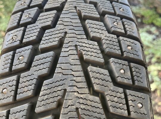 Like new studded tires and wheels 185/70R14