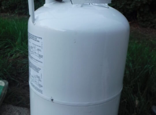 New never used propane tank and refill kit