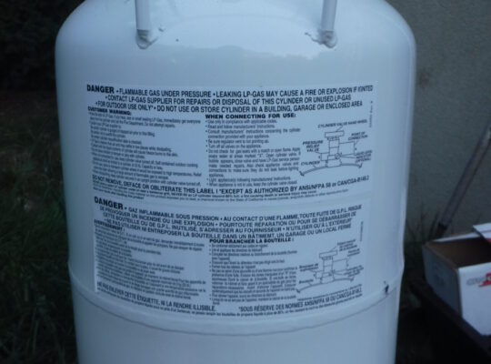 New never used propane tank and refill kit