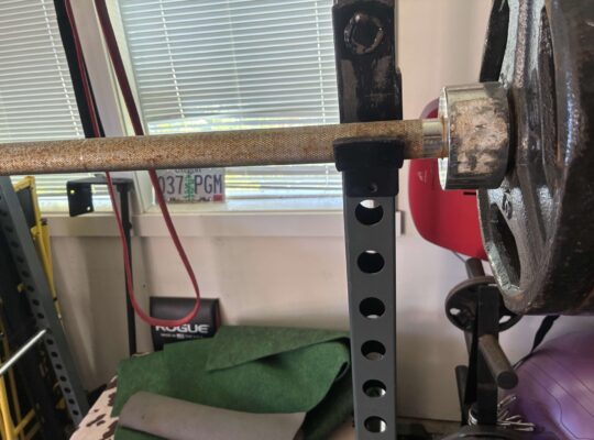 Exercise equipment squat rack bar weights bicycle